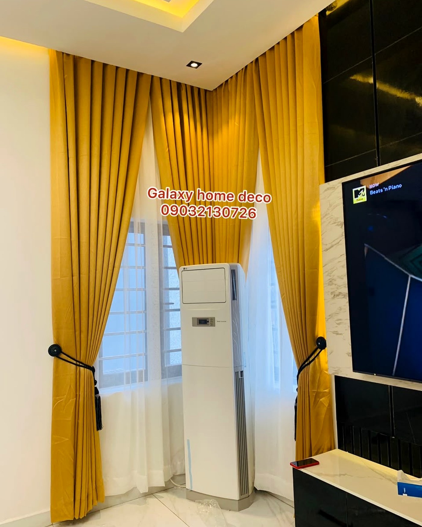 Layered silk drapes with decorative tiebacks